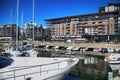 OSLO, NORWAY Ã¢â¬â AUGUST 17, 2016: People walking on modern district on street Stranden, Aker Brygge district with lux Royalty Free Stock Photo